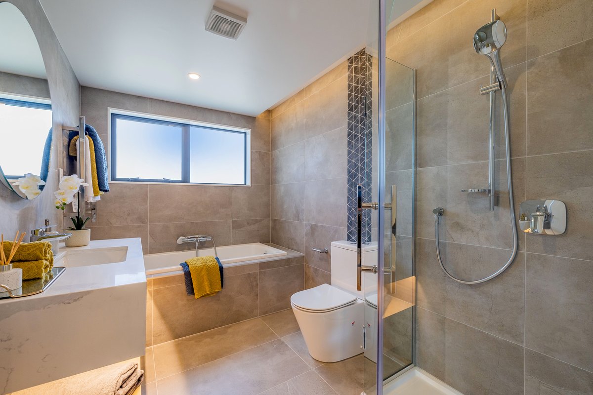 Tiled bathroom and vanity in a Concord home