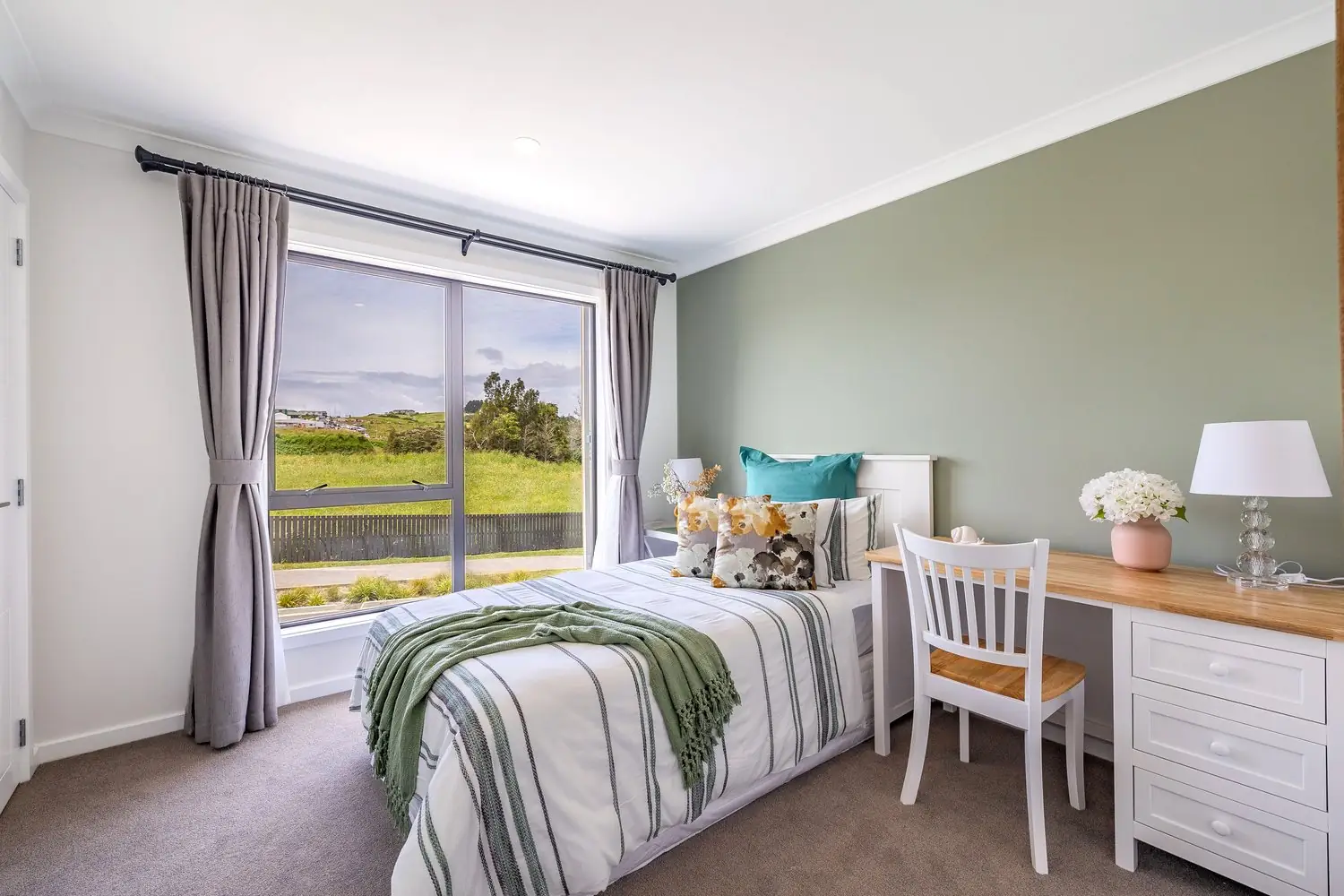 Second bedroom with a study desk