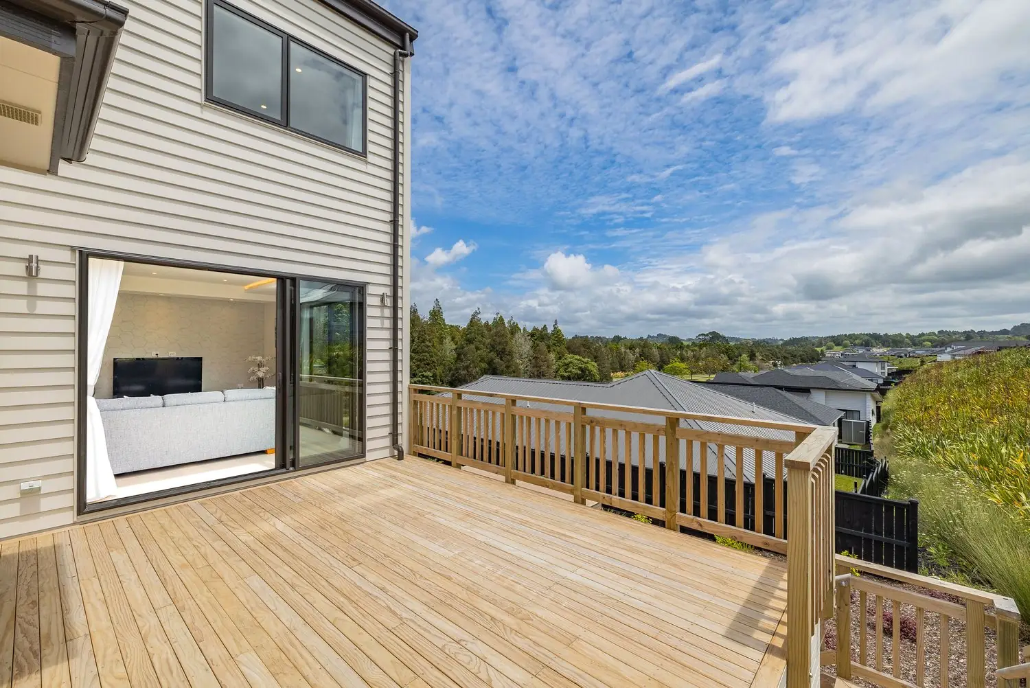 Covered outdoor deck with a rural outlook